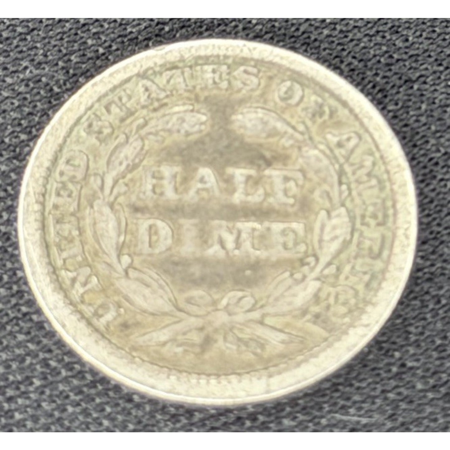 1858 Seated Liberty Half Dime reverse early silver coin