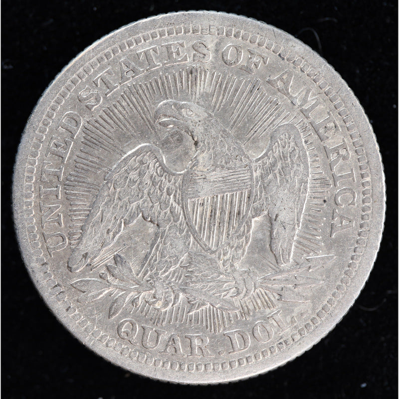 Reverse of 1853 Seated Liberty quarter showing eagle with rays and circulated silver surfaces