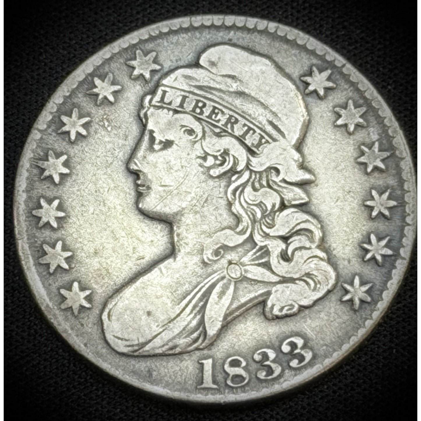 1833 Capped Bust Half Dollar obverse XF early silver coin