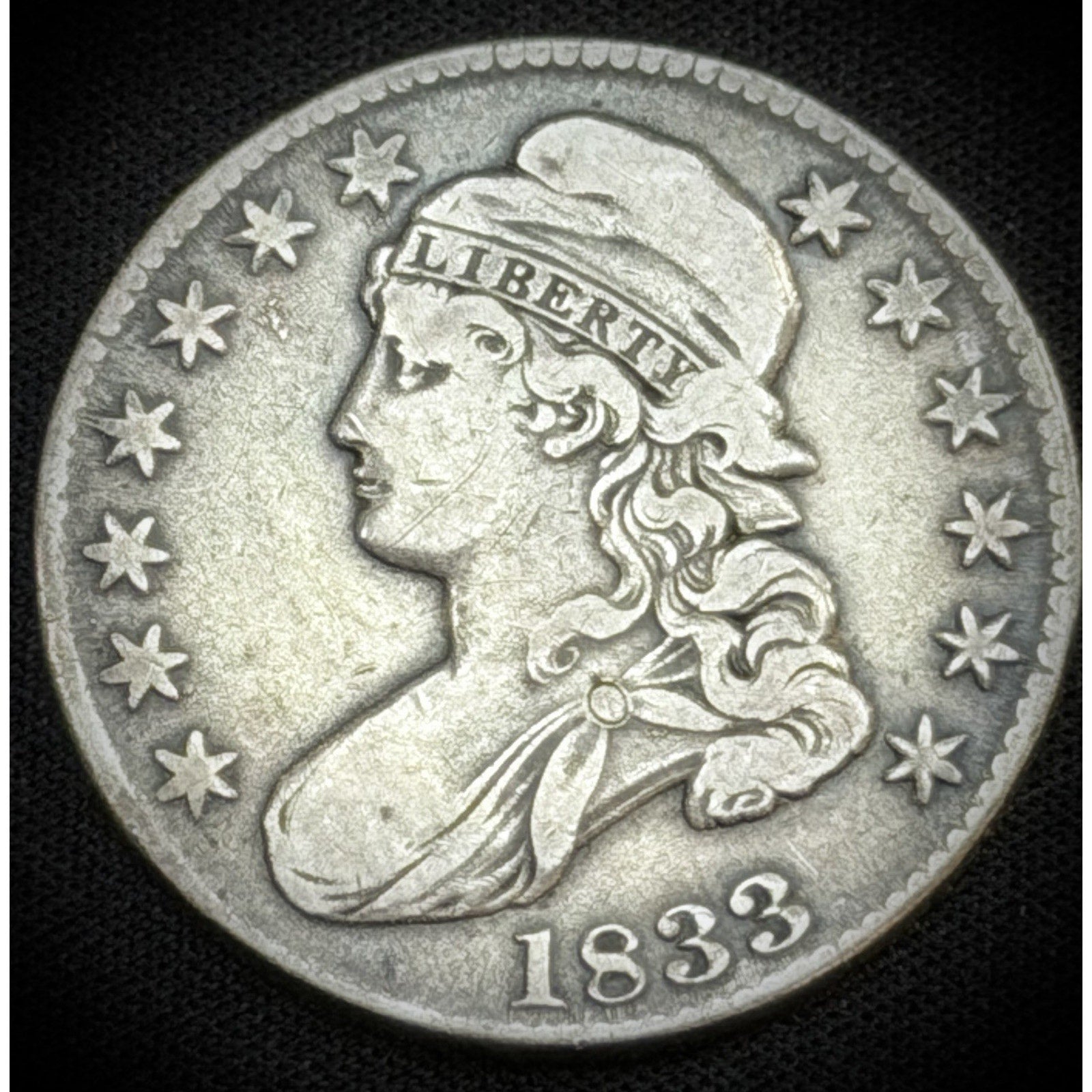 1833 Capped Bust Half Dollar obverse XF early silver coin