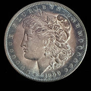 Silver Morgan Dollar coin from 1890 on a black background