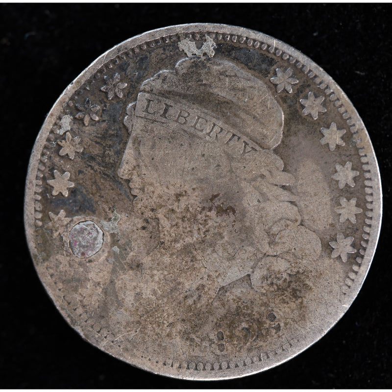 Obverse of holed 1829 Capped Bust dime showing Liberty portrait, heavy wear, and surface damage