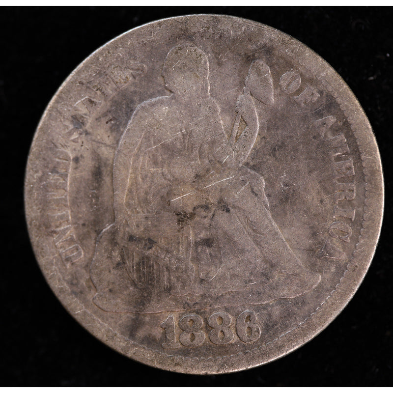 Obverse of 1886 Seated Liberty dime showing heavily worn Liberty figure and circulated silver surfaces