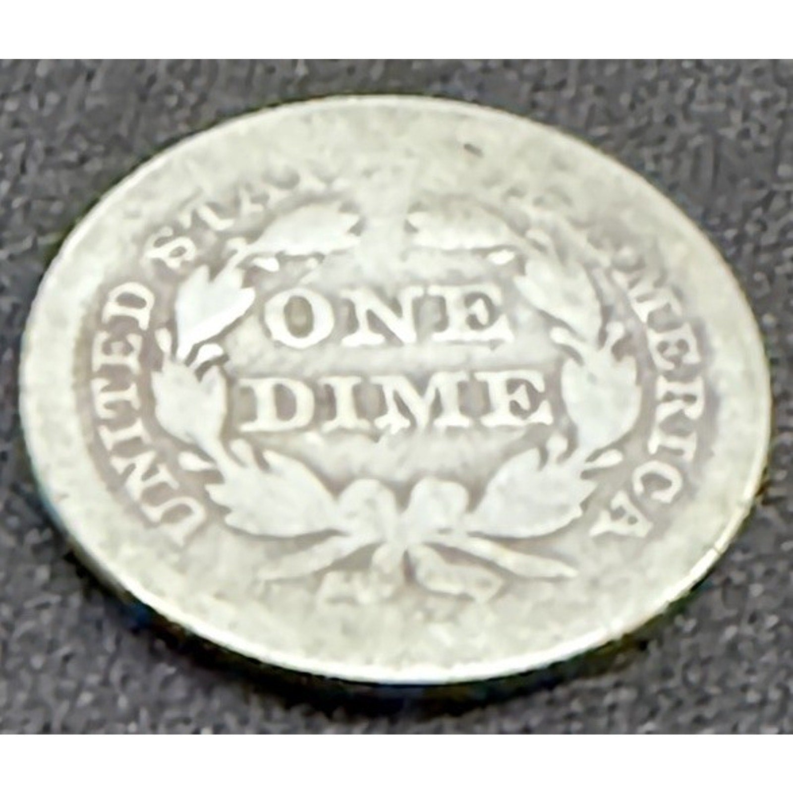1853 Arrows Seated Liberty Dime reverse wreath detail