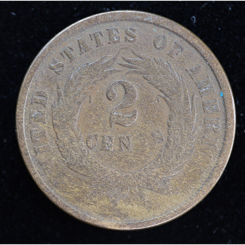 Obverse of 1864 United States Two Cent Piece with shield and IN GOD WE TRUST motto, showing heavy even wear