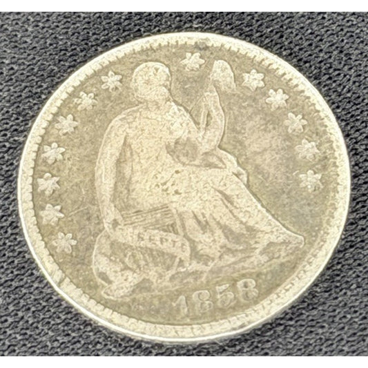 1858 Seated Liberty Half Dime obverse early silver coin
