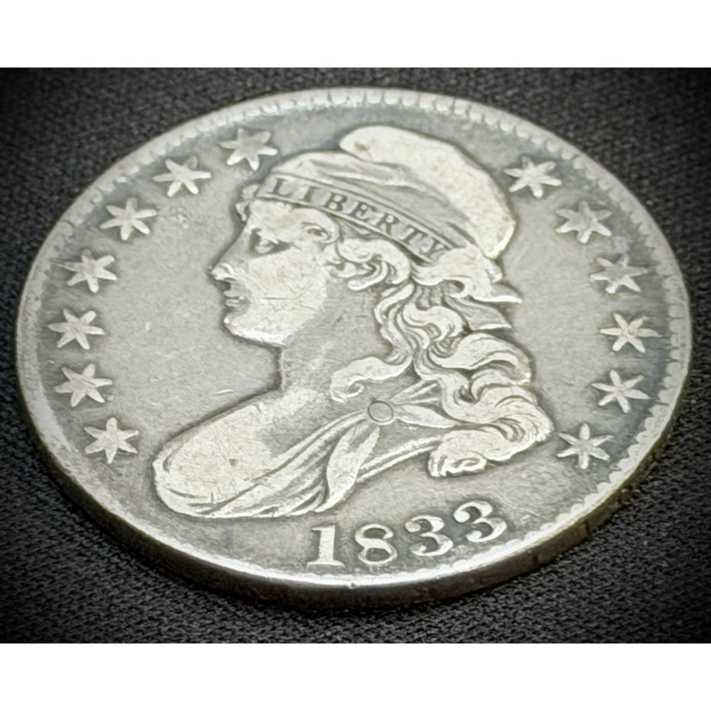 1833 Capped Bust Half Dollar obverse close view XF detail