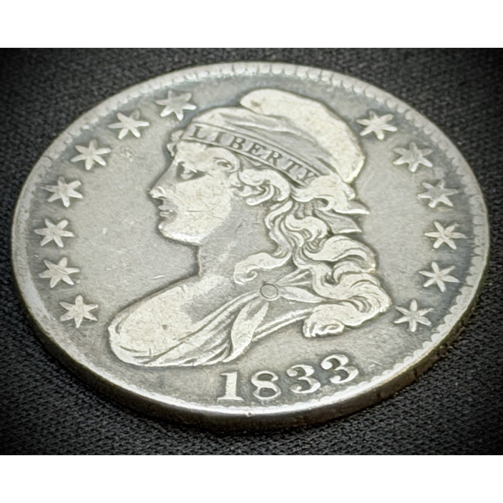 1833 Capped Bust Half Dollar obverse close view XF detail