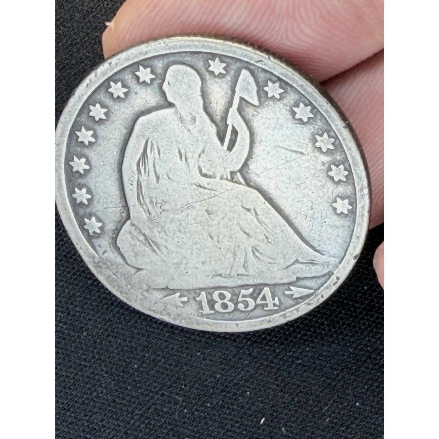 1854-O New Orleans Mint silver half dollar detail
