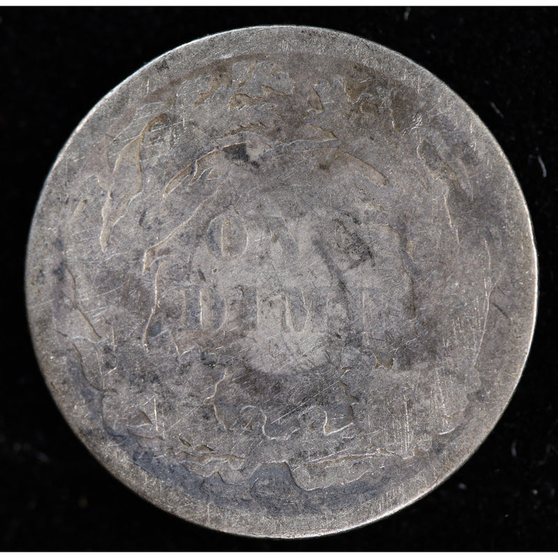 Reverse of 1886 Seated Liberty dime showing ONE DIME within wreath and numerous surface marks