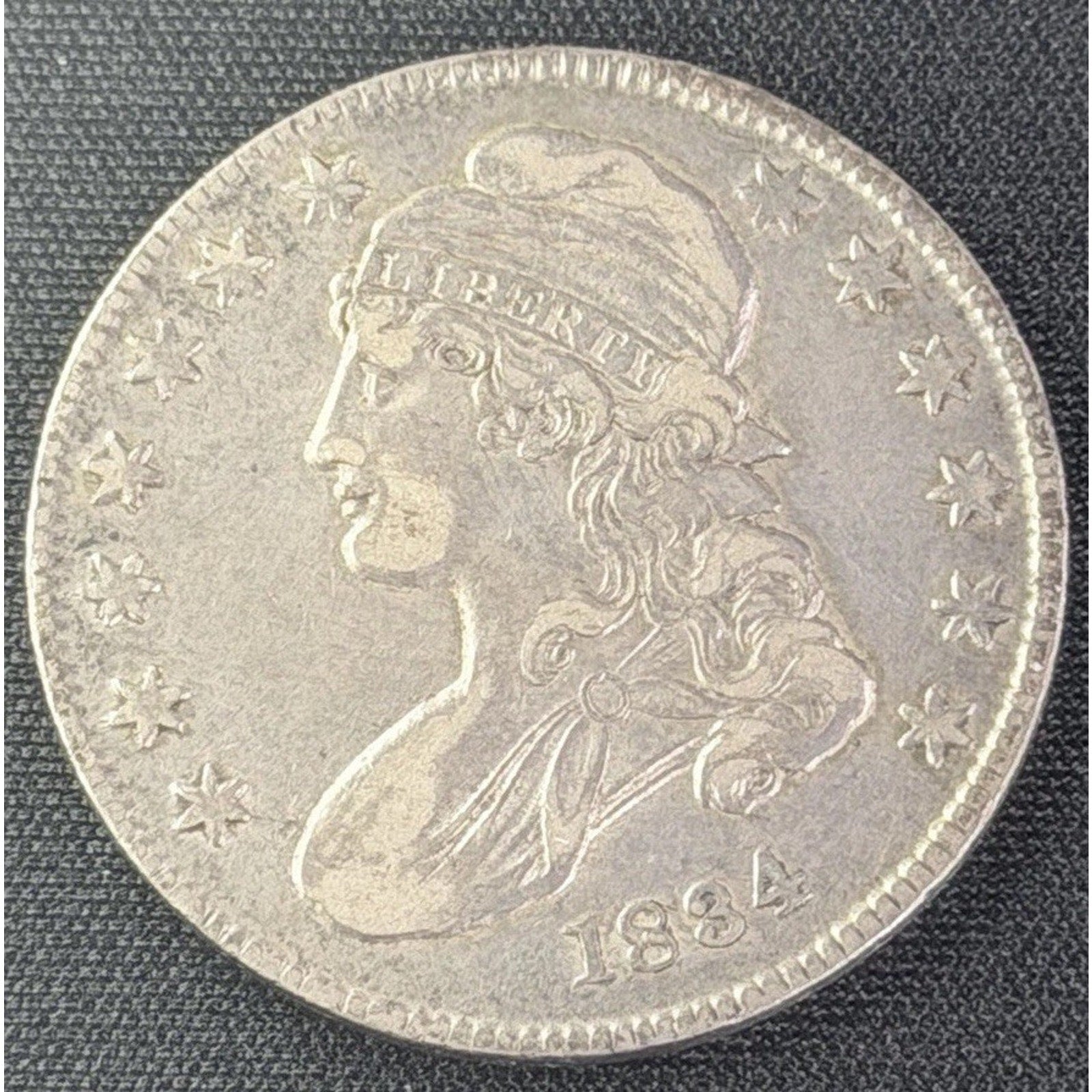1834 Small Date Stars Letters Capped Bust Half Dollar obverse