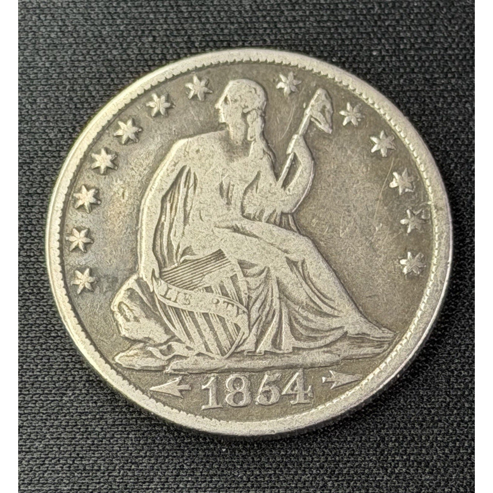1854 O Arrows Seated Liberty Half Dollar obverse silver 50C coin