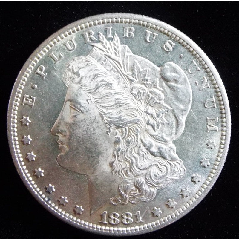 1881 S Morgan Silver Dollar obverse angled reflective surface view