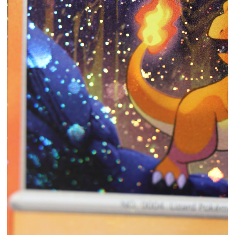 Charmander SVP 047 Double Swirl Cosmos Holo Black Star Promo