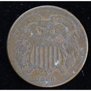 Reverse of 1864 United States Two Cent Piece showing 2 CENTS, wreath, wear, and verdigris